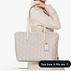 Kate Spade Cream Monogram Tote/barely used
Like new condition.